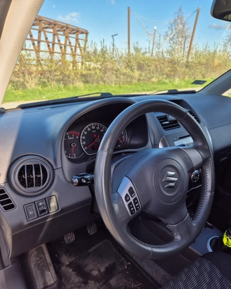 Suzuki SX4 cena 24000 przebieg: 97300, rok produkcji 2009 z Tychy małe 46